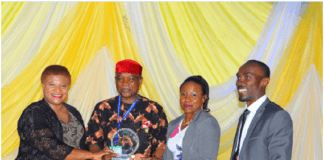 L-R: Pharm. Foluke Akinniranye, chief retail operations officer, HealthPlus Limited; Pharm. (Mazi) Sam I. Ohuabunwa, president PSN; Pharm. Toyin Arifayan, head, School of Pharmacy, HealthPlus Limited; Pharm. Valentine Ezeanochikwa, pharmacy manager, HealthPlus Limited receiving PSN Presidential Award for practicing pharmacy in the most ethical manner at the Pharmaceutical Society of Nigeria (PSN) 92nd Annual National Conference held in Kaduna, Kaduna State, recently.