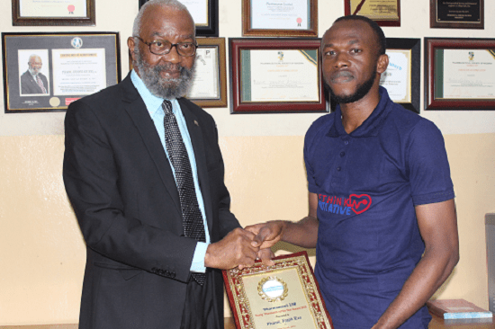 Pharmanews Celebrates Frank Eze, Presents Award Plaque, Cheque to Him